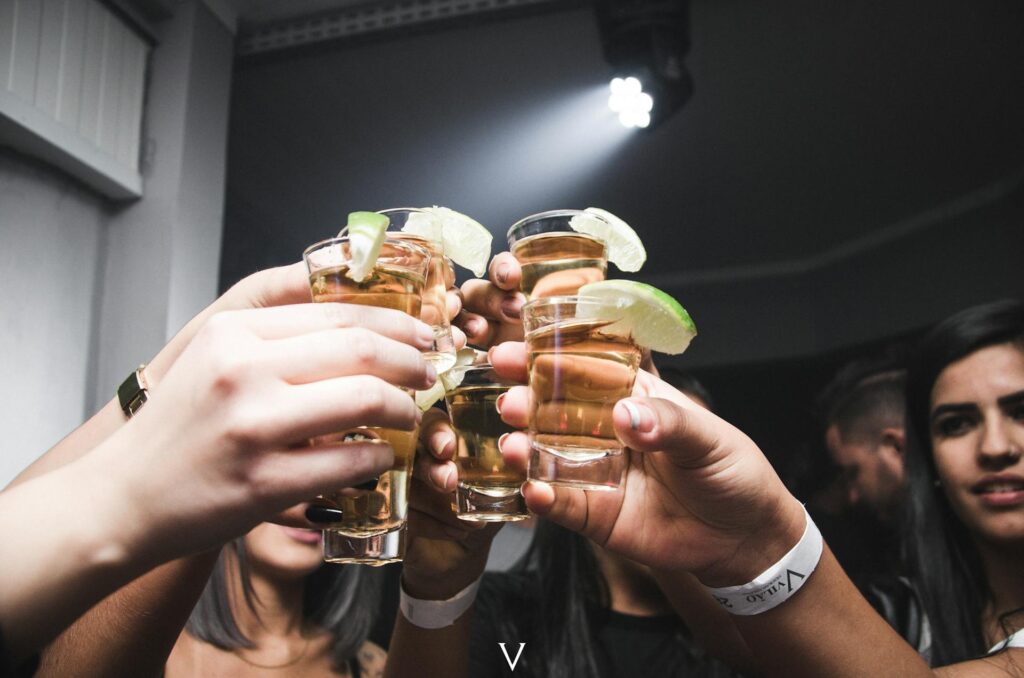 Raising tequila shots with lime – how drink packages work on a partybus ride.
